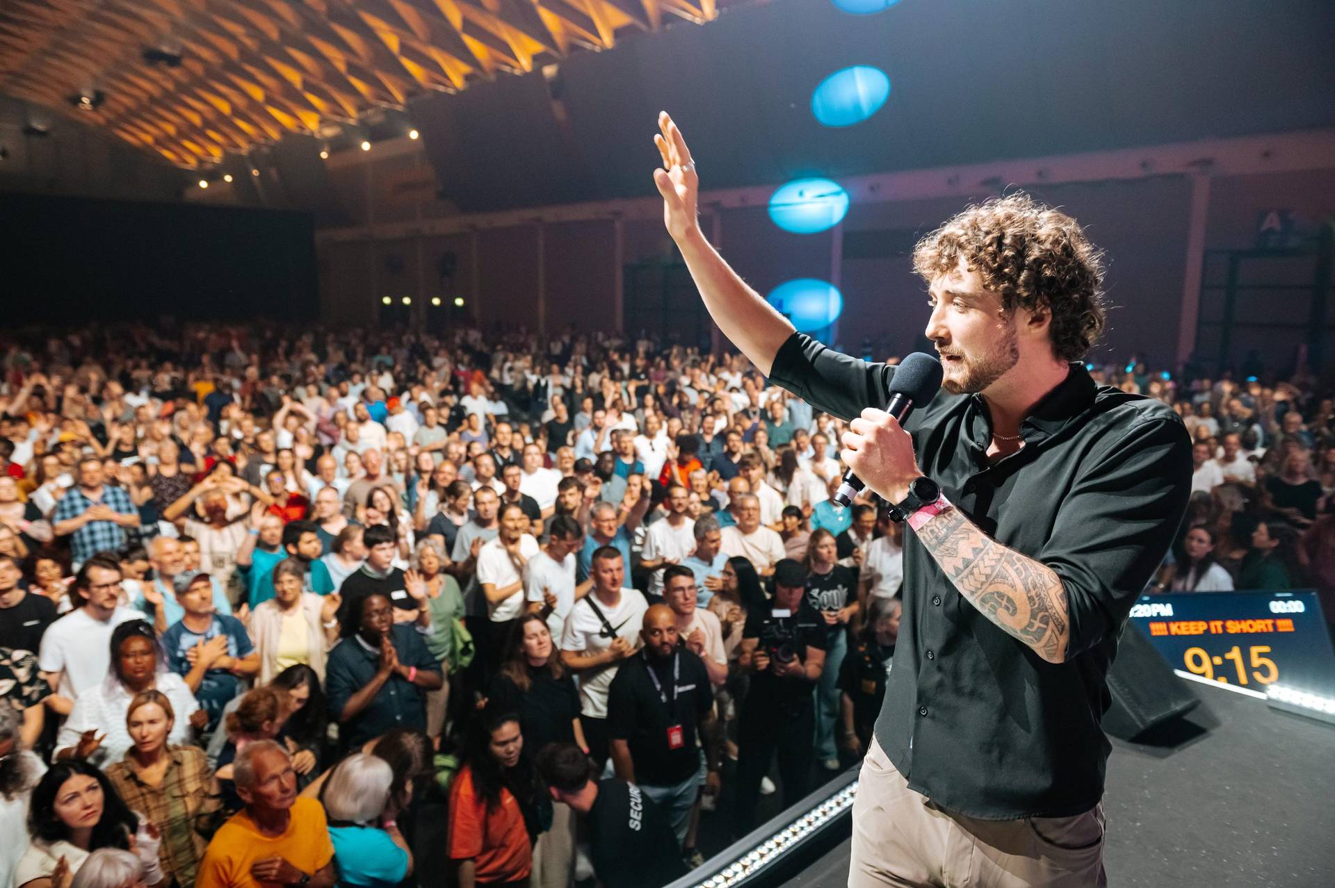 Chris preaching at a conference